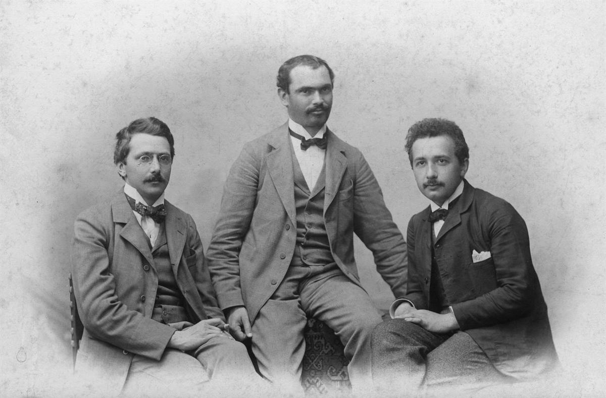 The Olympia Academy: three young men in formal dress posed in a studio, around 1903. Left to right: Conrad Habicht, Maurice Solovine, Albert Einstein.